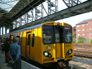 2:00pm Departed Chester Station Platform 7A on the far side via the stairs. And boarded the 2pm Merseyrail Service to Liverpool Central